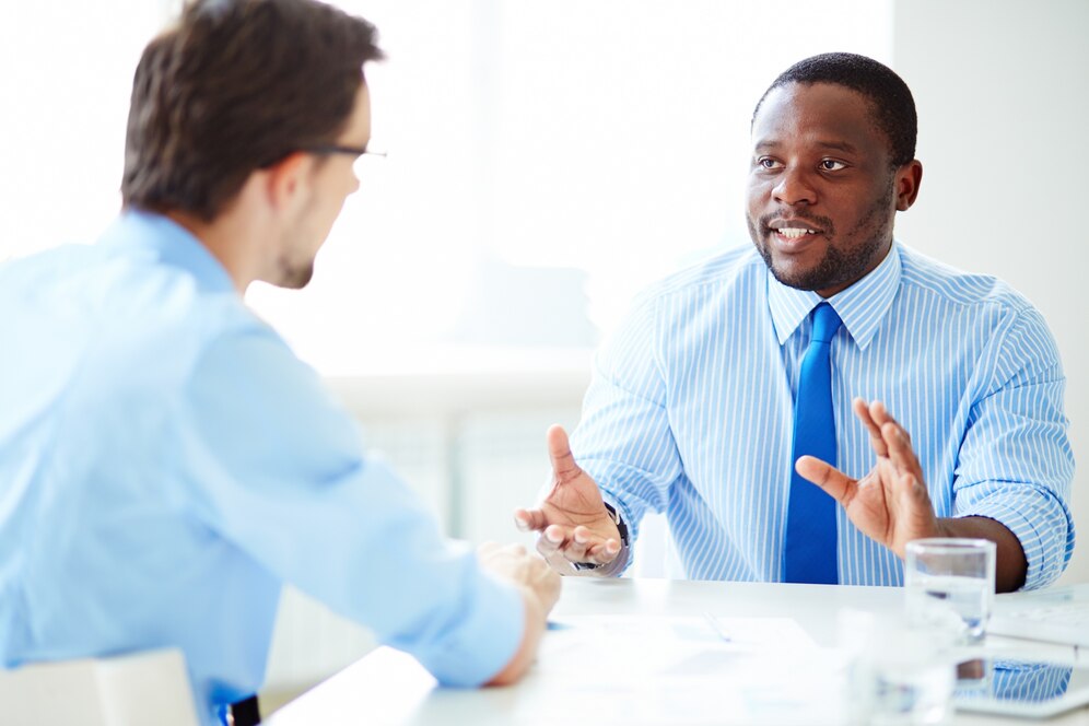 Two adults in a professional interview